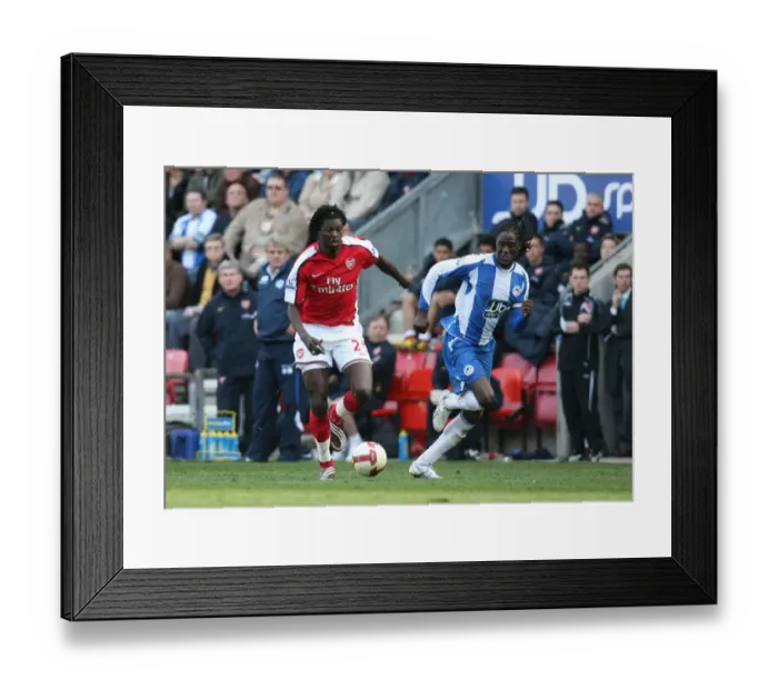Framed Print : Emmanuel Adebayor (Arsenal) Mario Melchiot (Wigan) Framed Print : Emmanuel Adebayor (Arsenal) Mario Melchiot (Wigan)