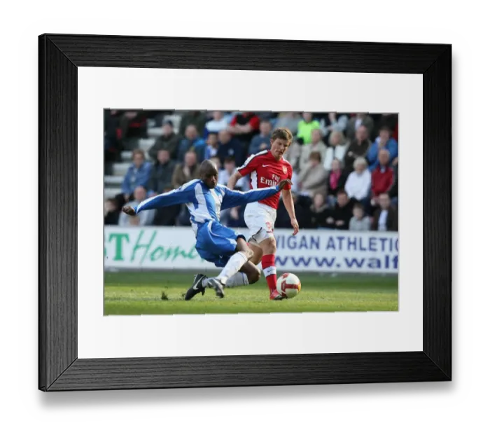 Framed Print : Andrey Arshavin (Arsenal) Emerson Boyce (Wigan) Framed Print : Andrey Arshavin (Arsenal) Emerson Boyce (Wigan)