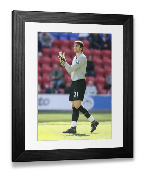Framed Print : Lukasz Fabianski's Dominance: Arsenal Crush Wigan Athletic 4-1 in Premier League