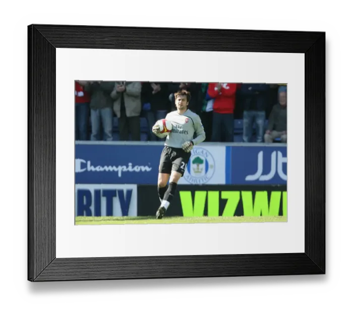 Framed Print : Lukasz Fabianski's Unbeatable Form: Arsenal's 4-1 Victory Over Wigan Athletic in the Premier League