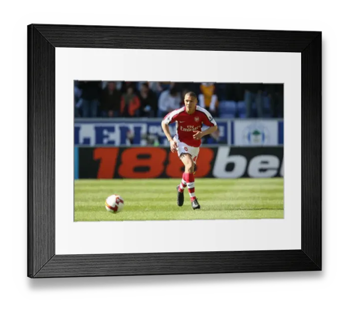 Framed Print : Kieran Gibbs Dominant Performance: Arsenal Crush Wigan Athletic 4-1 in Premier League Framed Print : Kieran Gibbs Dominant Performance: Arsenal Crush Wigan Athletic 4-1 in Premier League