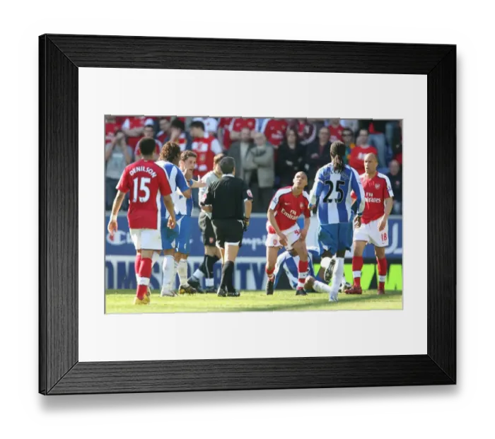 Framed Print : Kieran Gibbs Yellow Carded in Arsenal's 4-1 Victory over Wigan Framed Print : Kieran Gibbs Yellow Carded in Arsenal's 4-1 Victory over Wigan