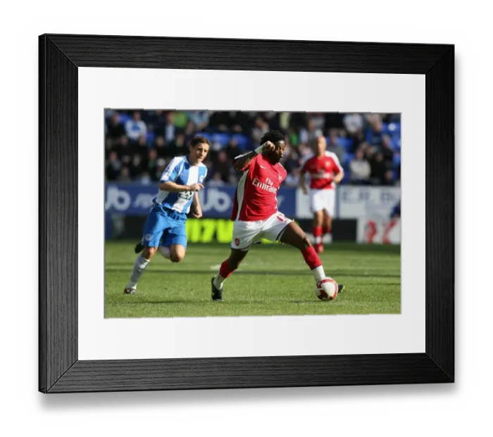 Framed Print : Alex Song (Arsenal) Michael Brown (Wigan) Framed Print : Alex Song (Arsenal) Michael Brown (Wigan)