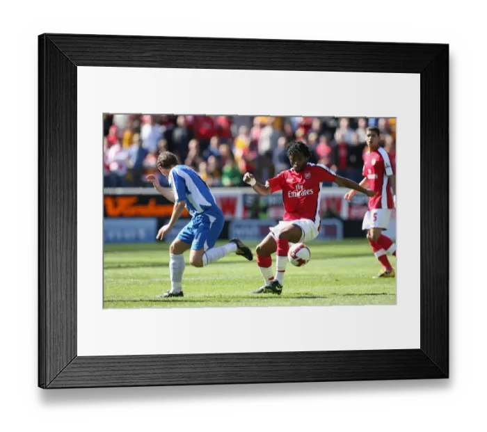 Framed Print : Alex Song's Dominance: Arsenal Crush Wigan 4-1 Framed Print : Alex Song's Dominance: Arsenal Crush Wigan 4-1