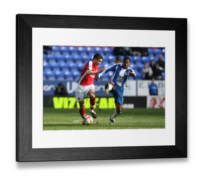 Framed Print : Robin van Persie (Arsenal) Antiono Valencia (Wigan) Framed Print : Robin van Persie (Arsenal) Antiono Valencia (Wigan)
