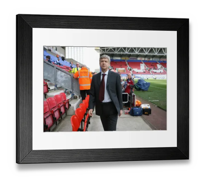 Framed Print : Arsene Wenger Leads Arsenal to a 4-1 Victory over Wigan Athletic in the Premier League