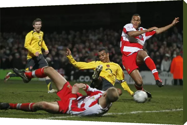 I. Gilberto scores Arsenals 2nd goal under pressure from Sam Oji (Doncaster)