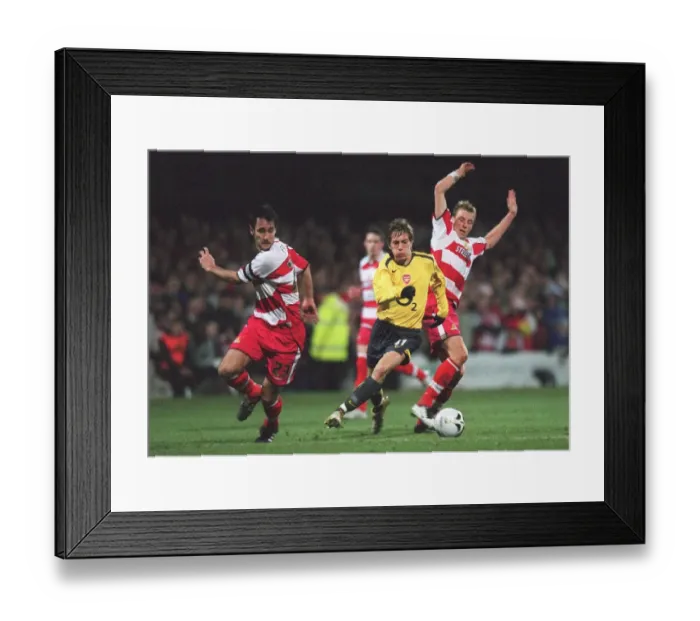 Framed Print : Arturo Lupoli (Arsenal) Steve Forster and Ricky Ravenhill (Doncaster) Framed Print : Arturo Lupoli (Arsenal) Steve Forster and Ricky Ravenhill (Doncaster)