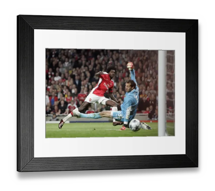 Framed Print : Adebayor's Strike: Arsenal Takes a 3-0 Lead over Villarreal in UEFA Champions League Quarterfinal