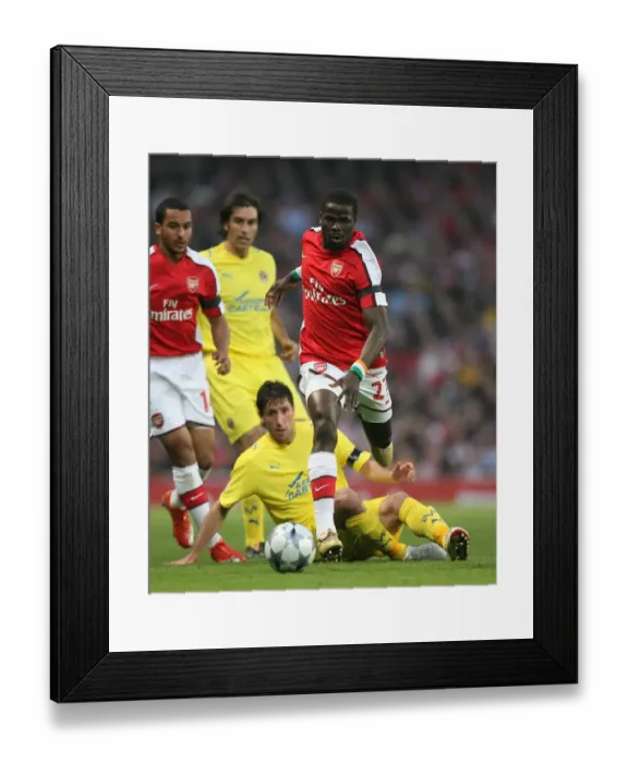 Framed Print : Arsenal's Eboue vs Capdevila: Unforgettable Clash in Arsenal's 3-0 Semi-Final Victory over Villarreal (15 / 4 / 2009) Framed Print : Arsenal's Eboue vs Capdevila: Unforgettable Clash in Arsenal's 3-0 Semi-Final Victory over Villarreal (15 / 4 / 2009)