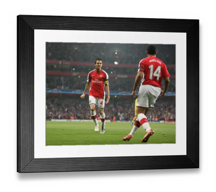 Framed Print : Cesc Fabregas and Theo Walcott: Arsenal's Unforgettable Goal Celebration in 3:0 Victory over Villarreal, UEFA Champions League 2009