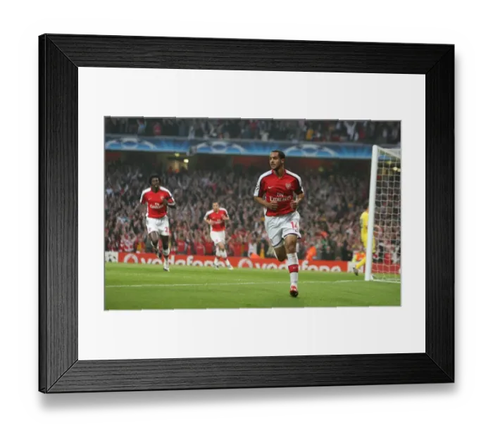 Framed Print : Theo Walcott's Historic First Goal: Arsenal Crushes Villarreal 3-0 in UEFA Champions League Quarterfinals