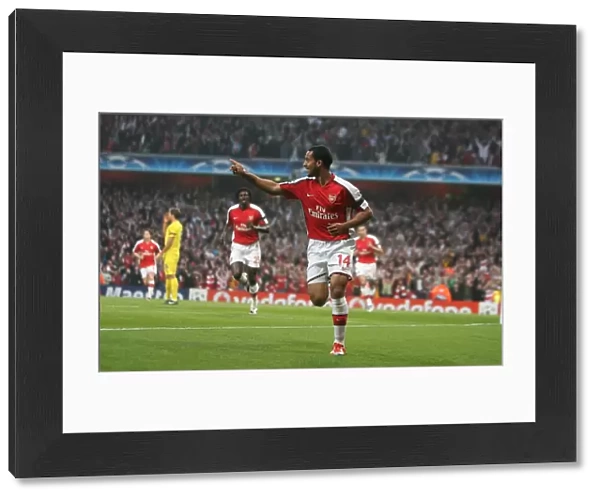 Theo Walcott celebrates scoring the 1st Arsenal goal