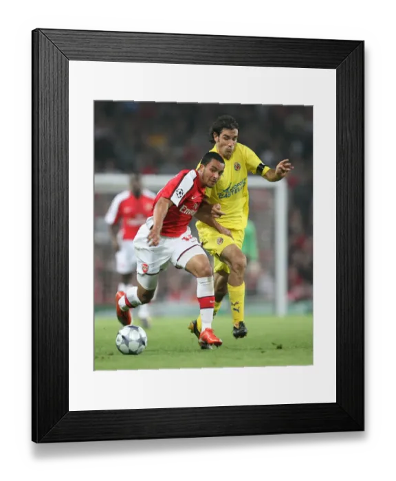 Framed Print : Theo Walcott's Brace Leads Arsenal to 3-0 Victory over Villarreal in UEFA Champions League Quarterfinals (Pires Included) Framed Print : Theo Walcott's Brace Leads Arsenal to 3-0 Victory over Villarreal in UEFA Champions League Quarterfinals (Pires Included)