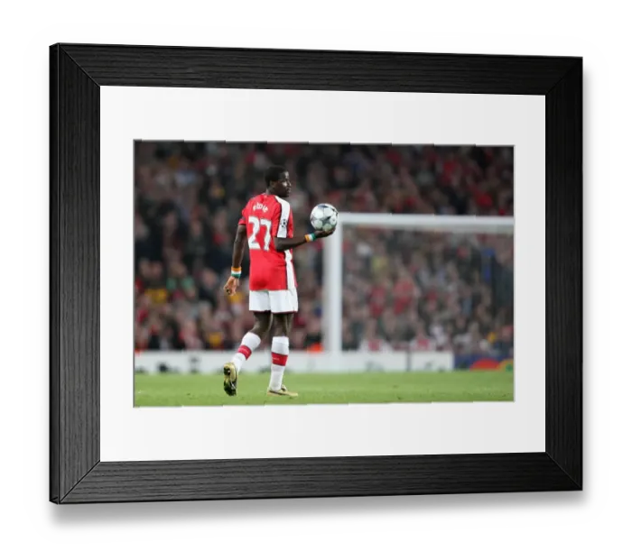 Framed Print : Arsenal's Emmanuel Eboue Celebrates in UEFA Champions League Quarterfinal Victory over Villarreal