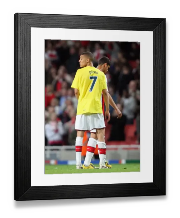 Framed Print : Kieran Gibbs (Arsenal) leaves the pitch wearing Robert Pires shirt Framed Print : Kieran Gibbs (Arsenal) leaves the pitch wearing Robert Pires shirt