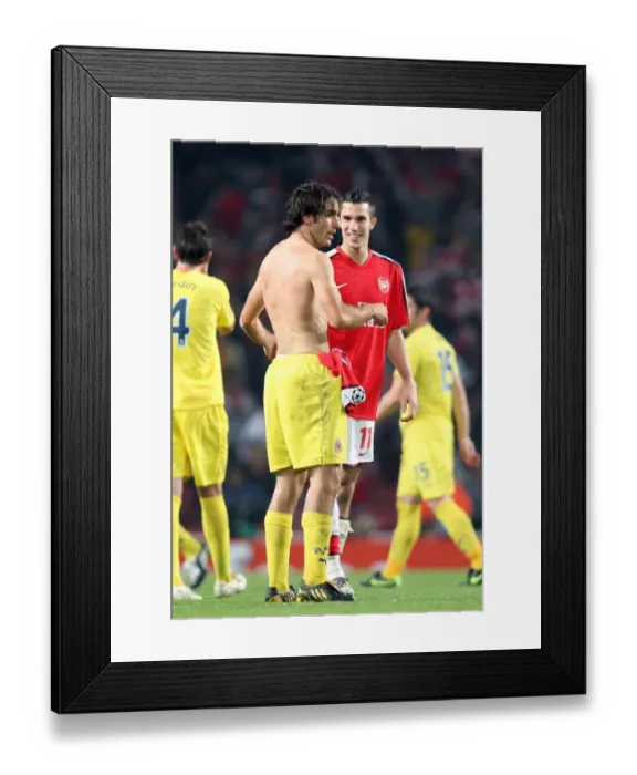 Framed Print : Robin van Persie's Chat with Robert Pires: Arsenal's 3-0 Victory over Villarreal in the UEFA Champions League Quarterfinals (2009) Framed Print : Robin van Persie's Chat with Robert Pires: Arsenal's 3-0 Victory over Villarreal in the UEFA Champions League Quarterfinals (2009)