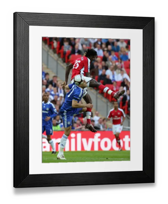Framed Print : Emmanuel Adebayor (Arsenal) Alex (Chelsea) Framed Print : Emmanuel Adebayor (Arsenal) Alex (Chelsea)