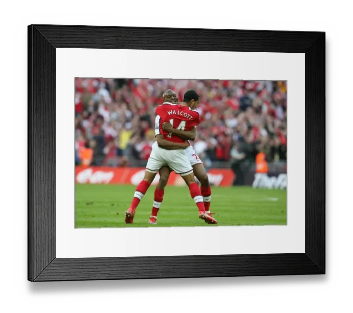 Framed Print : Theo Walcott celebrates scoring the Arsenal goal with Abou Diaby