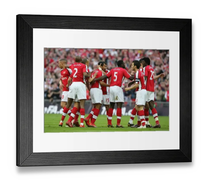 Framed Print : Theo Walcott celebrates scoring the Arsenal goal with Abou Diaby