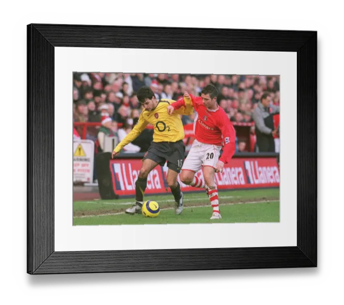 Framed Print : Cesc Fabregas (Arsenal) Bryan Hughes (Charlton). Charlton Athletic 0: 1 Arsenal Framed Print : Cesc Fabregas (Arsenal) Bryan Hughes (Charlton). Charlton Athletic 0: 1 Arsenal
