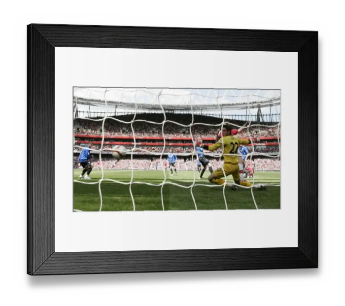 Framed Print : Cesc Fabregas Scores the Opener: Arsenal's Victory Over Middlesbrough in the Premier League Framed Print : Cesc Fabregas Scores the Opener: Arsenal's Victory Over Middlesbrough in the Premier League