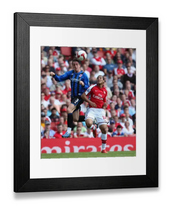 Framed Print : Theo Walcott (Arsenal) Andrew Taylor (Middlesbrough) Framed Print : Theo Walcott (Arsenal) Andrew Taylor (Middlesbrough)