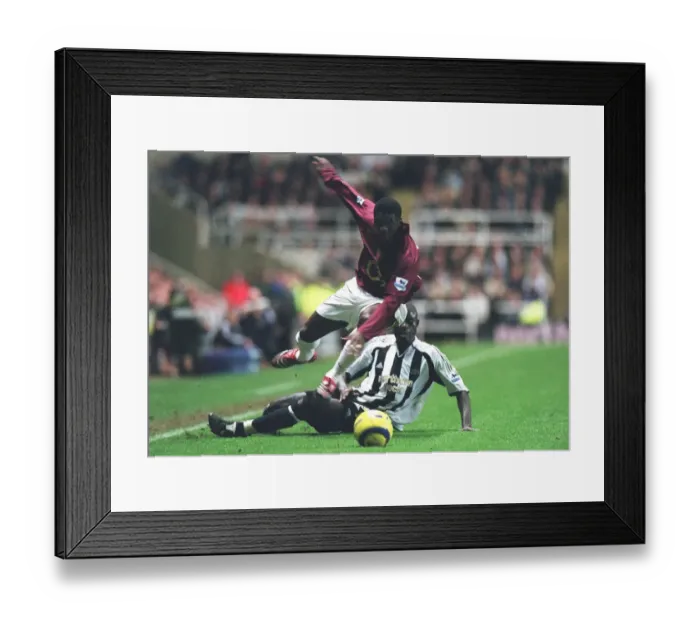 Framed Print : Kolo Toure vs. Amdy Faye: Newcastle United's 1-0 Victory Over Arsenal at St. James Park, FA Premiership, 10 / 12 / 2005