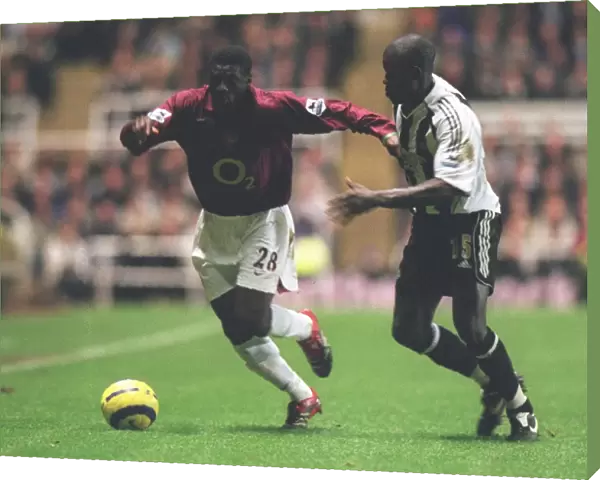 Kolo Toure (Arsenal) Amdy Faye (Newcastle United)