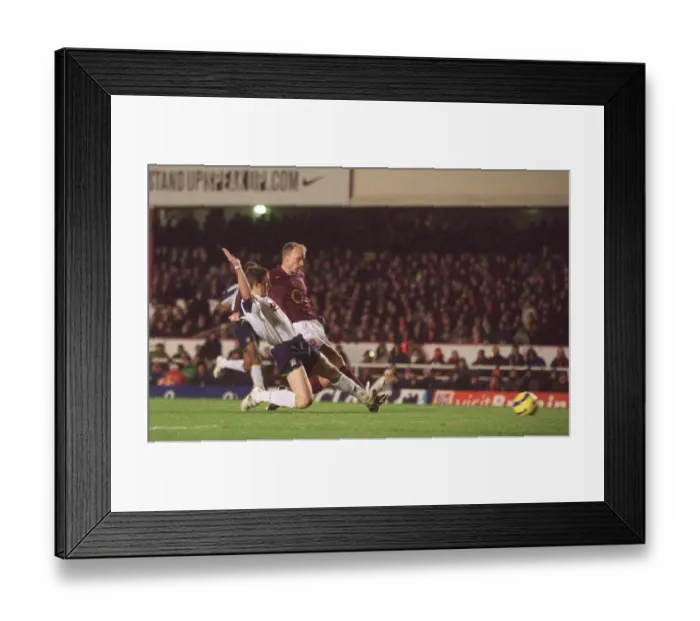 Framed Print : Dennis Bergkamp's Stunner: Arsenal's First Goal in 4-0 Victory over Portsmouth, FA Premiership, Highbury, London, 28 / 12 / 05 Framed Print : Dennis Bergkamp's Stunner: Arsenal's First Goal in 4-0 Victory over Portsmouth, FA Premiership, Highbury, London, 28 / 12 / 05