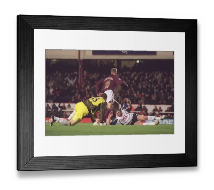 Framed Print : Dennis Bergkamp's Euphoric Goal: Arsenal's Unforgettable 4-0 Victory Over Portsmouth, December 2005
