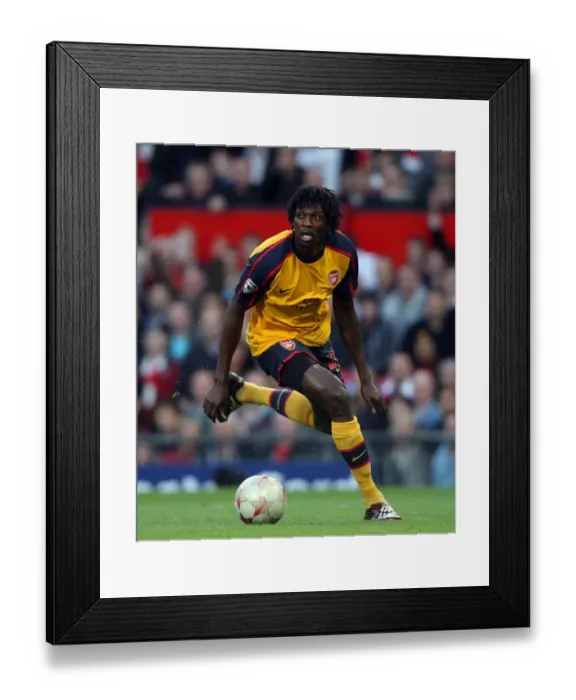 Framed Print : Emmanuel Adebayor's Determined Performance in Manchester United vs. Arsenal, UEFA Champions League Semi-Final 1st Leg (April 29, 2009) Framed Print : Emmanuel Adebayor's Determined Performance in Manchester United vs. Arsenal, UEFA Champions League Semi-Final 1st Leg (April 29, 2009)