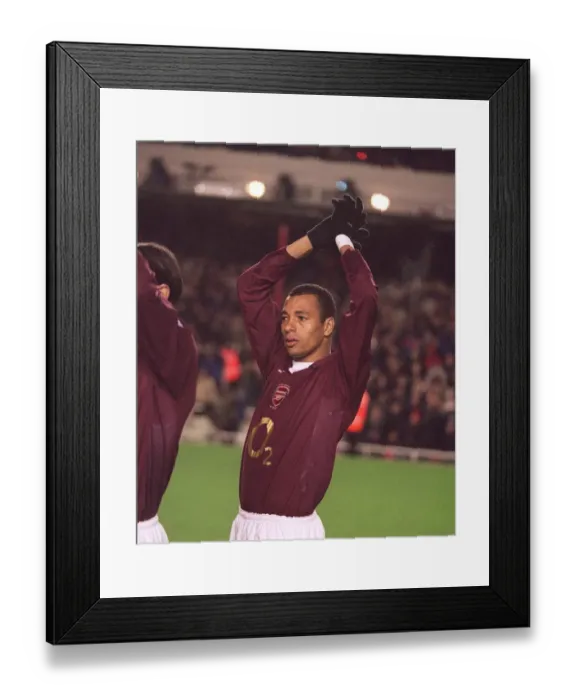 Framed Print : Gilberto (Arsenal) claps the fans before the match. Arsenal 4: 0 Portsmouth