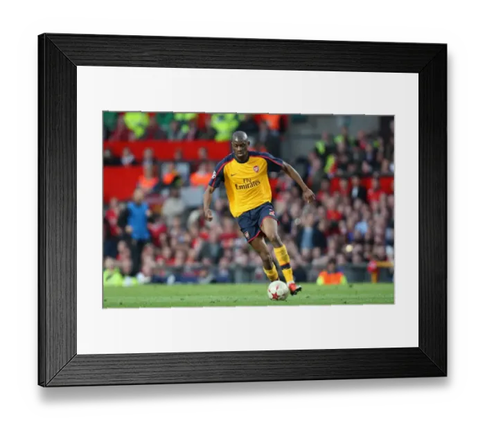 Framed Print : Abou Diaby's Determined Performance in Arsenal's 1:0 Semi-Final Loss to Manchester United in the UEFA Champions League at Old Trafford, April 29, 2009