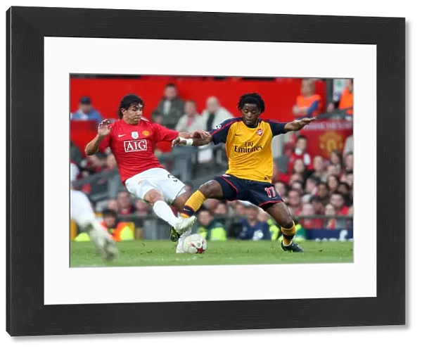 Alex Song (Arsenal) Carlos Tevez (Man Utd)