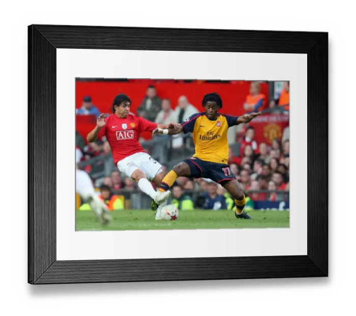 Framed Print : Alex Song (Arsenal) Carlos Tevez (Man Utd) Framed Print : Alex Song (Arsenal) Carlos Tevez (Man Utd)