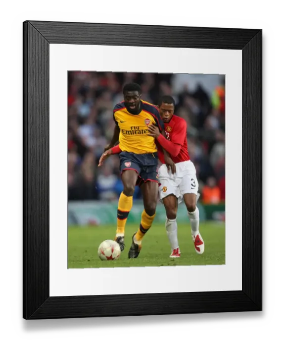 Framed Print : Kolo Toure (Arsenal) Patrice Evra (Man Utd)