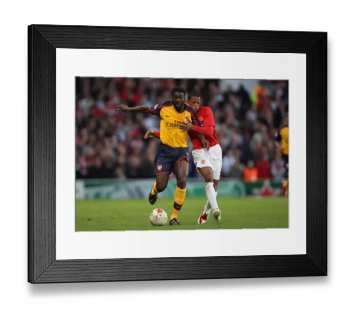 Framed Print : Kolo Toure vs. Patrice Evra: Manchester United Edges Arsenal in Champions League Semi-Final Showdown Framed Print : Kolo Toure vs. Patrice Evra: Manchester United Edges Arsenal in Champions League Semi-Final Showdown