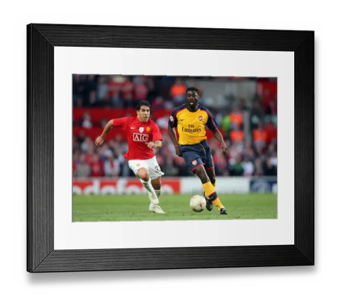 Framed Print : Kolo Toure (Arsenal) Carlos Tevez (Man Utd) Framed Print : Kolo Toure (Arsenal) Carlos Tevez (Man Utd)