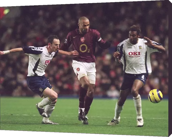Thierry Henry (Arsenal) Andy O Brien and John Viafara (Portsmouth)