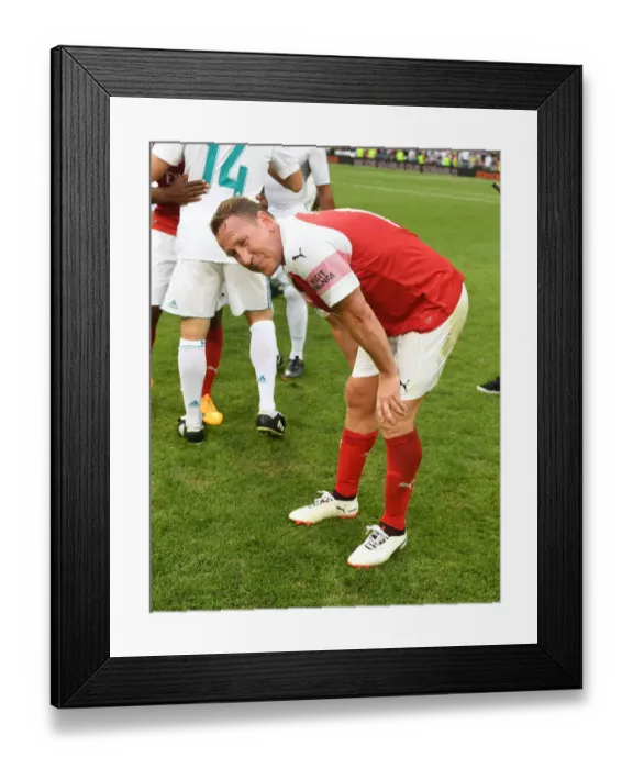 Framed Print : Arsenal Legends vs. Real Madrid Legends: A Legendary Clash at Bernabeu (2018-19)