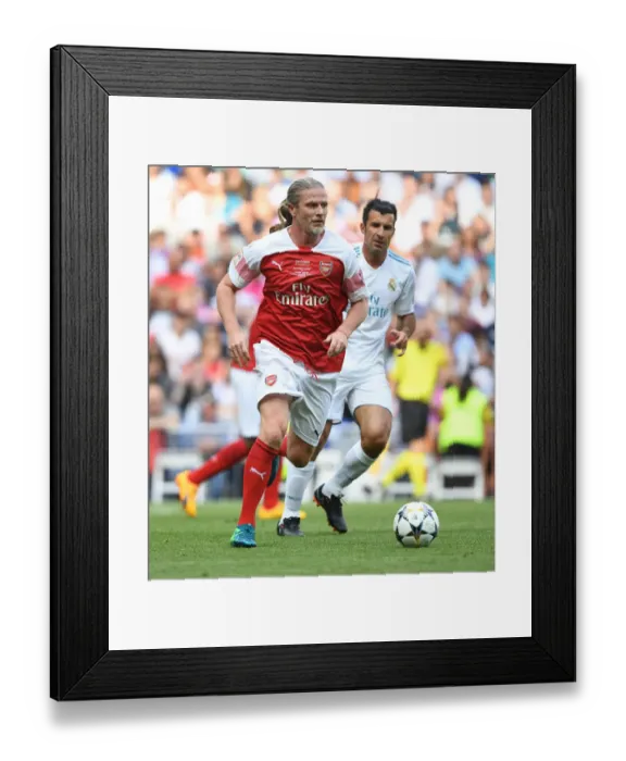 Framed Print : Arsenal vs. Real Madrid: A Legendary Clash at Bernabeu (2018-19)