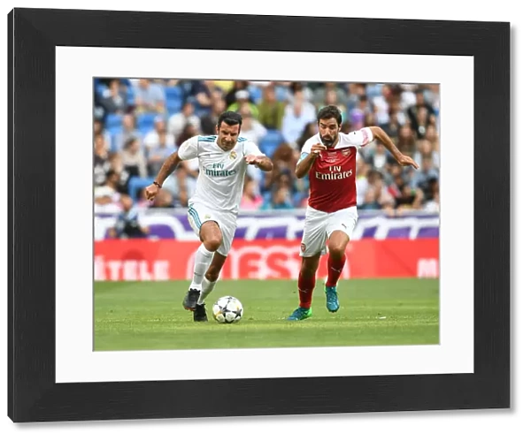 A Clash of Football Greats: Pires vs Figo - Arsenal vs Real Madrid