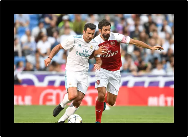 Pires vs. Figo: A Legendary Clash on the Bernabeu Field - Arsenal Legends vs. Real Madrid Legends (2018-19)