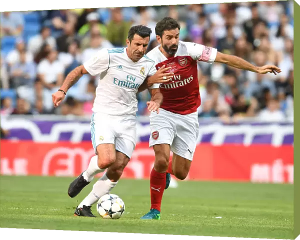 Pires vs. Figo: A Legendary Clash on the Bernabeu Field - Arsenal Legends vs. Real Madrid Legends (2018-19)