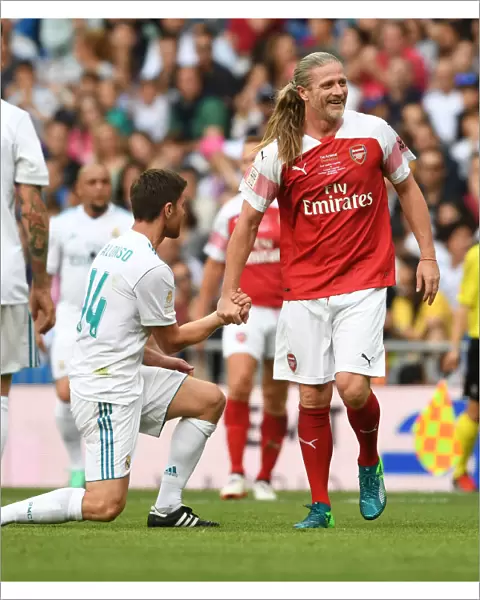 Clash of Football Legends: Emmanuel Petit vs. Xabi Alonso - Arsenal vs. Real Madrid (2018-19)