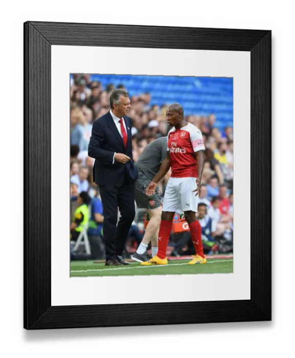 Framed Print : Arsenal Legends vs Real Madrid Legends: A Clash of Football Greats at Bernabeu (2018-19)