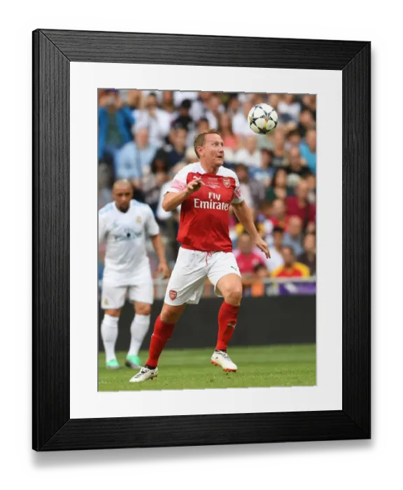 Framed Print : Arsenal vs. Real Madrid: A Legendary Clash in Madrid, 2018 Framed Print : Arsenal vs. Real Madrid: A Legendary Clash in Madrid, 2018