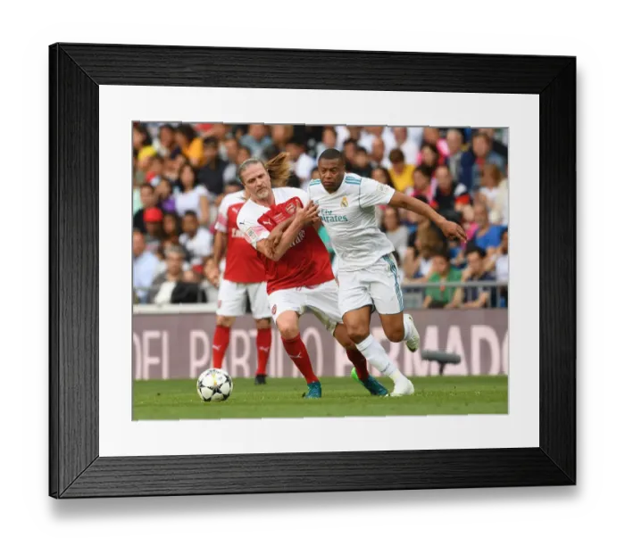 Framed Print : Clash of Legends: Emmanuel Petit vs. Julio Baptista - Real Madrid vs. Arsenal