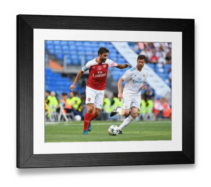 Framed Print : Clash of Legends: Pires vs. Xavi - A Football Rivalry Reignited Framed Print : Clash of Legends: Pires vs. Xavi - A Football Rivalry Reignited